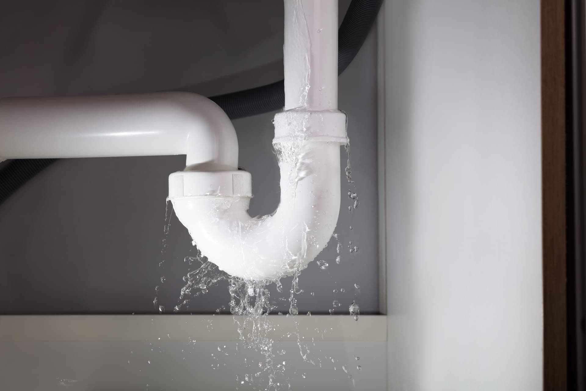 Home plumbing and roof areas showing common water damage entry points