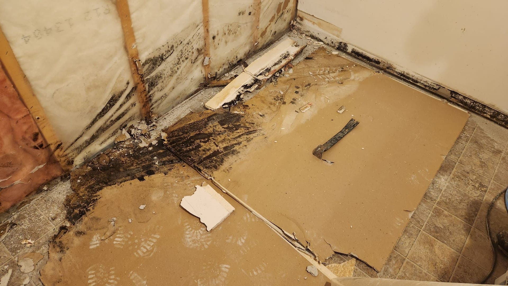 Water-stained drywall with hidden mould growing behind the surface