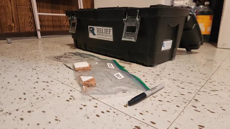 Asbestos bulk sample collection for accredited lab analysis in a pre-renovation Manitoba building