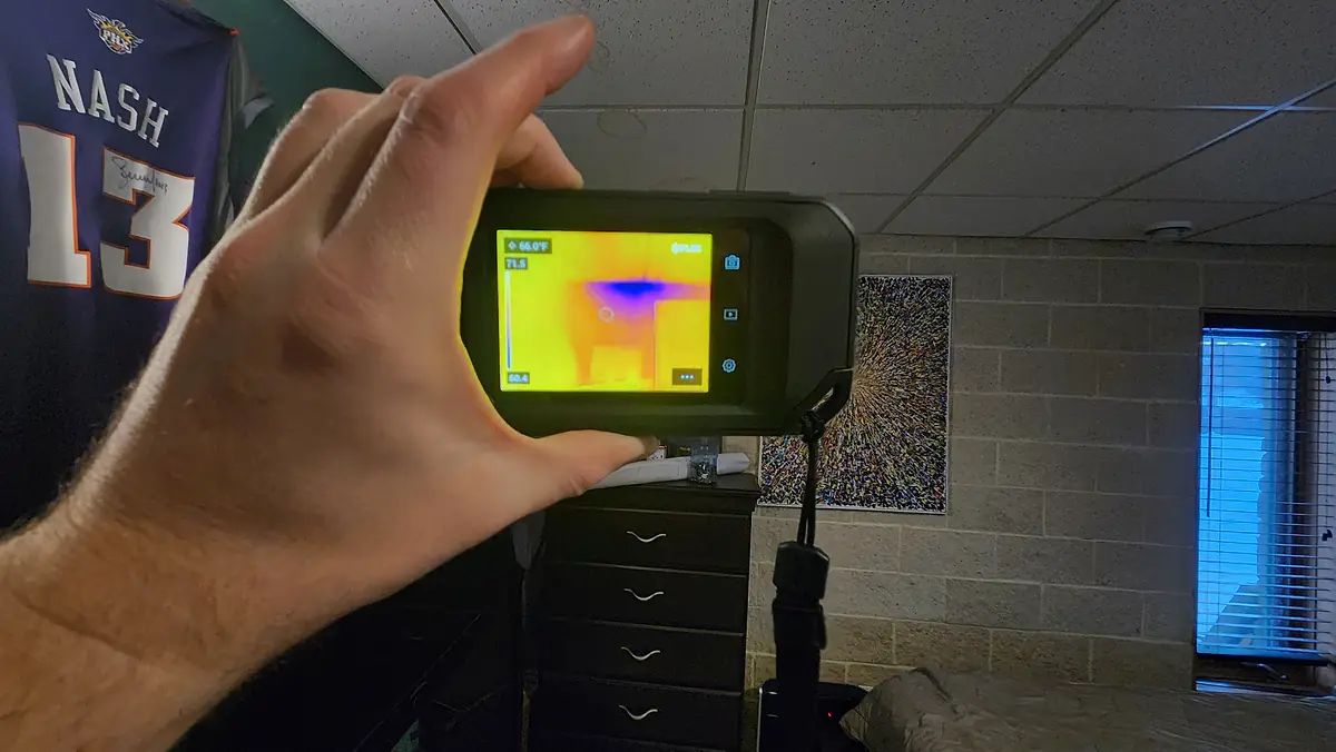 Thermal imaging camera used to detect hidden moisture during an inspection